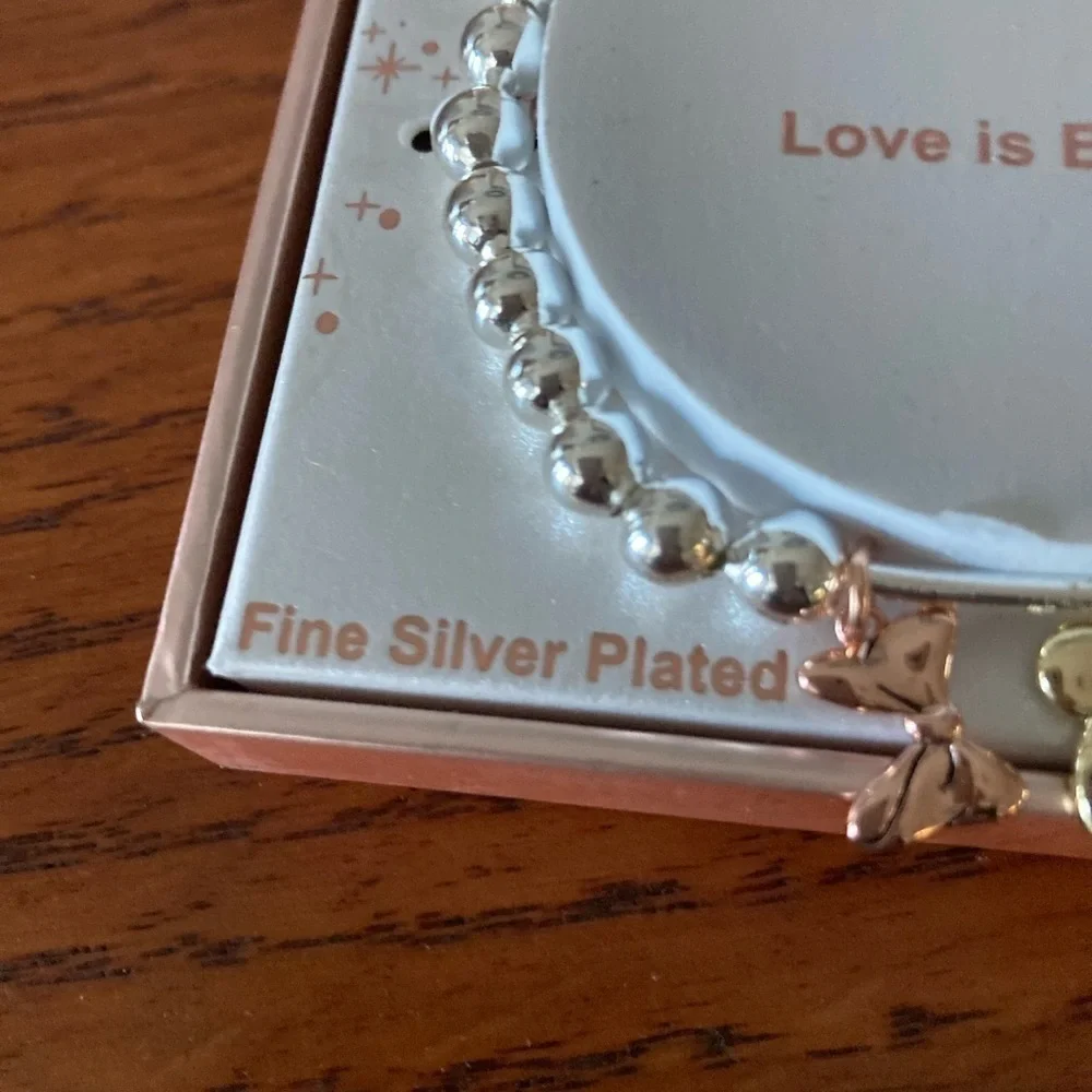 Disney Love is Bowtiful Bracelet Silver plated new never worn
